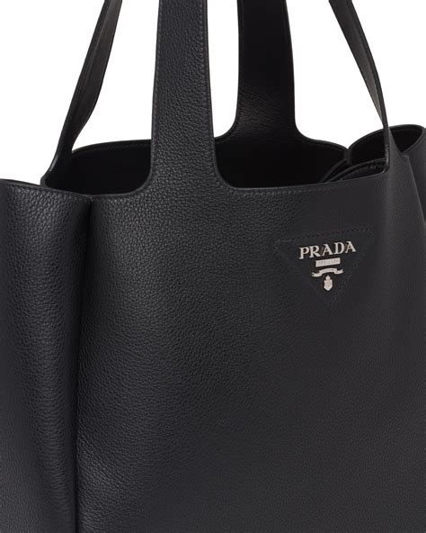 prada bag charms|prada leather tote bag black.